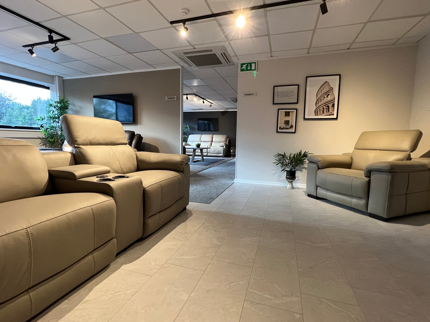 A selection of our cutting-end power recliners in our Gloucester sofa showroom.
